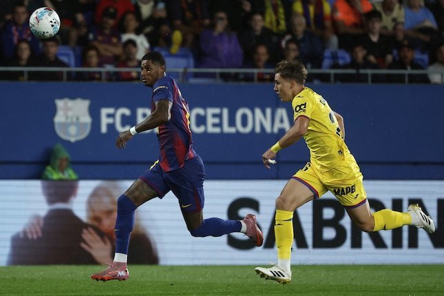 Marcus Rashford berebut bola dengan pemain Getafe
